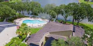1/1 in the Heart of Brandon with a lake view! Gallery 16