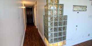 Sweeping Views from this partially furnished 1 Bed 1 Bath Condo w/ 1 Covered Parking Gallery 7