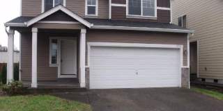 Spacious 4 Bedroom Home w/ Fully Fenced Yard & 2 Car Garage! Gallery 1