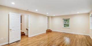 5 BR 4.5 BA home with inground heated pool and extensive hardscape! Gallery 33