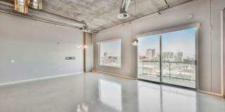 Modern Industrial Loft at Soho Lofts – 1BR/2BA High-Rise in the Arts District, City & Mountain Views! Gallery 7