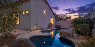 Tastefully Updated 3 bedroom with an Office!!!  Gated Community!!! Oasis of a yard with no neighbors behind, Pool and Hot Tub!!!  Located in Dove Valley Ranch close to golfing!!!  Ready NOW!!! Gallery 1