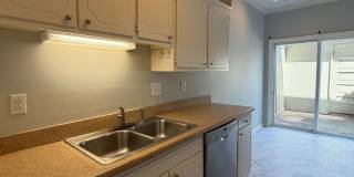 Prime Quail Hollow location! End-unit townhome with private patio, pool access, and HOA-covered maintenance - pets welcome. Gallery 4