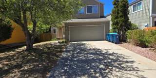 Charming 4‑Bed Home in Louisville features bright, open living space, with open deck & garden! Gallery 1
