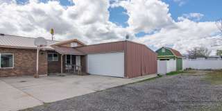 Spacious 3 Bed 2 Bath Brick Home with RV Parking, Shop Space & Large Yard in Tremonton! Gallery 4