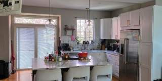 Stunning 3–4 Bedroom Townhome in Private Community | Garage + EV Charger | Deck with Tree Views Gallery 6
