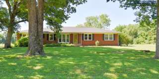 All Brick 3bd 2ba home with attached garage on a large lot! Gallery 1