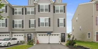 Spacious 3BR 3.5 Bath Townhome (Pet Friendly), Finished Basement with full bathroom, Spacious Kitchen, Stone Fireplace and 2 Decks Gallery 1