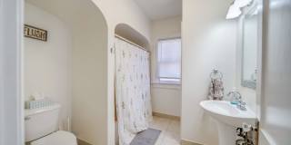 Charming 5-Bedroom Home with Exposed Brick and Modern Upgrades Gallery 38