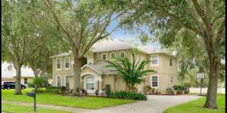Spacious 5-Bedroom Gated Pool Home with Theater and Flexible Furnishings Gallery 1