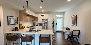 Top‑Floor Corner Condo with Downtown Views — Stylish, Pristine, and Steps From Everything Gallery 7