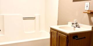 Cozy and conveniently located 1 bedroom, 1 bathroom first-floor apartment with a private entrance! Gallery 8