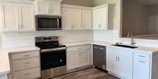 zero entry ranch townhome with 2 stall garage.  Spacious 2 bedroom/2.5 bath Gallery 1