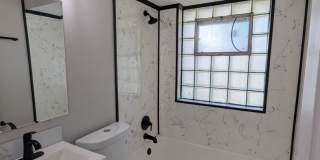 Updated Open-Concept with Sunroom & Finished Basement Space Gallery 13