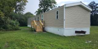 Welcome to this beautifully remodeled 2-bedroom, 2-bathroom home in Hubert, NC. Gallery 1