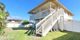 Malimali Street home with garage, fenced yard, central A/C, stainless steel kitchen appliances & sink, large upper lanai, nice flooring, ceiling fans with lights, large kitchen with island, partially furnished Malimali Street home with garage, fenced yard, central A/C, stainless steel kitchen appliances & sink, large upper lanai, nice flooring, ceiling fans with lights, large kitchen with island, partially furnished Gallery 1