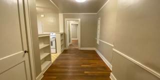 1 bedroom, living dining den near Central and Highland Gallery 6