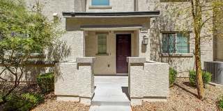 Beautiful corner lot townhome with custom paint, plentiful community green spaces. Gallery 1
