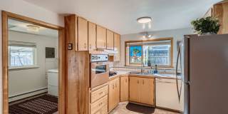 AVAILABLE NOW, LARGE YARD AND DETACHED 2 CAR GARAGE, UPDATED FLOORS AND BATH, $0 DEPOSIT OPTIONS! Gallery 8