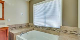 Summerlin!! 5 bedroom home!! W/Bed bath downstairs!! 3 Car Garage!! Synthetic grass in front yard. Back has patio. Summerlin!! 5 bedroom home!! W/Bed bath downstairs!! 3 Car Garage!! Synthetic grass in front yard. Back has patio. Gallery 44