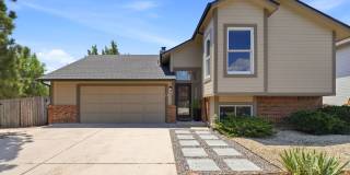 Updated 3 Bed Home in D20 with Bonus Room & Pikes Peak Views Gallery 1