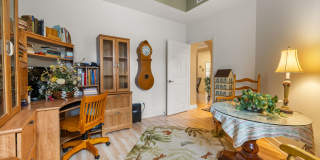 Experience Bell Tower Park. GATED ground floor 2 Bed 2 Bath Den 1 Car Garage Condo. Gallery 17