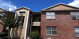 3/2 Regency Gardens 1st Floor Condo with New Plank Fooring, Stainless Appliances, and Fresh Paint! Gallery 1