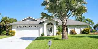 2BR/2BA Englewood Waterfront Home with Private Dock, Boat Lift & 2-Car Garage — $2,300/mo Gallery 1