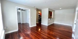 MOVE IN NOW!! Gated community Miriada! 1st floor 1X1.5 bath condo near pool area!!! Laminate wood flooring in living area and carpet in bedroom! Has washer & dryer! Gas stove & water heater! Gallery 6