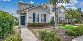 Relax & Unwind in this Spacious End-Unit Townhome Gallery 1