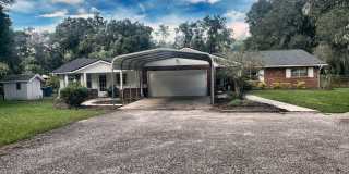 Exceptional 2.7-Acre DeLand Estate with Pool, Private Apartment, Generator, Garden & Oversized Garage Gallery 1