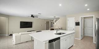 Beautiful Open Layout 4 Bed, 3 Full Bath | A True Masterpiece Backing to a Peaceful Pond with Modern Upgrades + Tesla Charging Gallery 8
