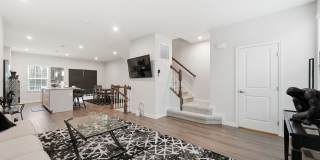 Welcome to this like new fully furnished home located in The Village at Courthouse Commons in Spotsylvania. Gallery 8