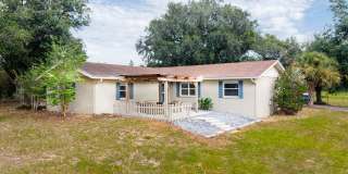 AVAILABLE NOW: 4 Bed 3 Bath Oversized Lot with 1,500 SF Workshop in Winter Garden Gallery 1