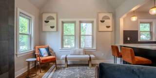 Completely remodeled like new Gingerbread midtown cottage with gleaming hardwoods, converted from a 3/1 to a 3/2. Gallery 14