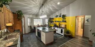 UNFURNISHED Three Bedroom in the Woods ~ Huge Outbuildings with Sauna ~ Garden~ Acreage! Gallery 1