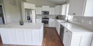 Bright & modern main floor living in newer home! Gallery 6