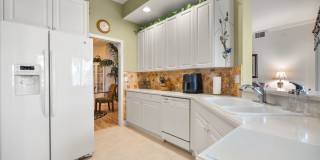 Experience Bell Tower Park. GATED ground floor 2 Bed 2 Bath Den 1 Car Garage Condo. Gallery 7