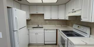 Enjoy comfortable living in this spacious 2-bedroom, 2-bathroom condo in a convenient Lauderhill location. Gallery 1
