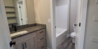 Looks Almost  New Twin Home! Move is Special! Gallery 14