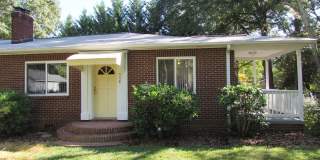 Spacious 2 Bed/1 Bath Duplex - Updated - Fireplace - Covered Side Porch - Water/Sewer/Trash Included Gallery 1