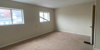 Great 2 bed 2 bath with bonus attic space house located steps from shopping. Gallery 13