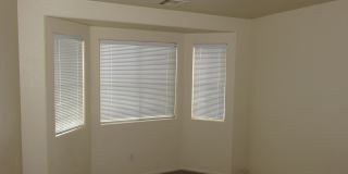 Huge family room with kitchen nicely tucked in the middle. Gallery 6