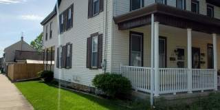 Pet friendly duplex w brand new kitchen & first floor LVP, basement, fenced yard, deck, near community pool Gallery 1