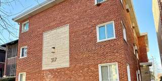 Pristine 2 Bedroom, 1 Bathroom Condo Available NOW! Heat, Water, Parking INCLUDED in Rent! Pristine 2 Bedroom, 1 Bathroom Condo Available NOW! Heat, Water, Parking INCLUDED in Rent! Gallery 1