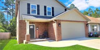 Dreamy Two-Story Home in Gated Heron Bayou with Community Pool! Gallery 1