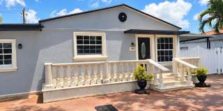 Charming 2‑Bedroom Home + Private 1‑Bedroom Attached Suite & Exceptional Parking – Opa‑Locka, FL Gallery 1