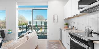 Modern downtown condo studio with private balcony & parking space. Gallery 1