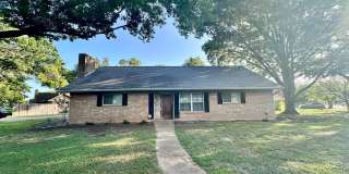 Available Now! Unique 4-Bedroom 2.5-Bath Corner Lot Home with Outdoor Kitchen & Detached Garage Available Now! Unique 4-Bedroom 2.5-Bath Corner Lot Home with Outdoor Kitchen & Detached Garage Gallery 1