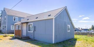 MOVE-IN SPECIAL! Completely Renovated 2 Bedroom Home Near PLU | New Kitchen & Stainless Appliances Gallery 1